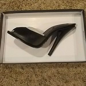 Sling back open toed heels